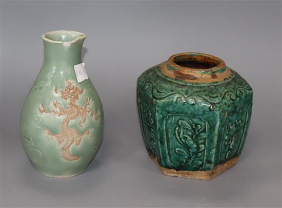 A Chinese Qing dynasty celadon glazed dragon and phoenix bottle and a green glazed jar